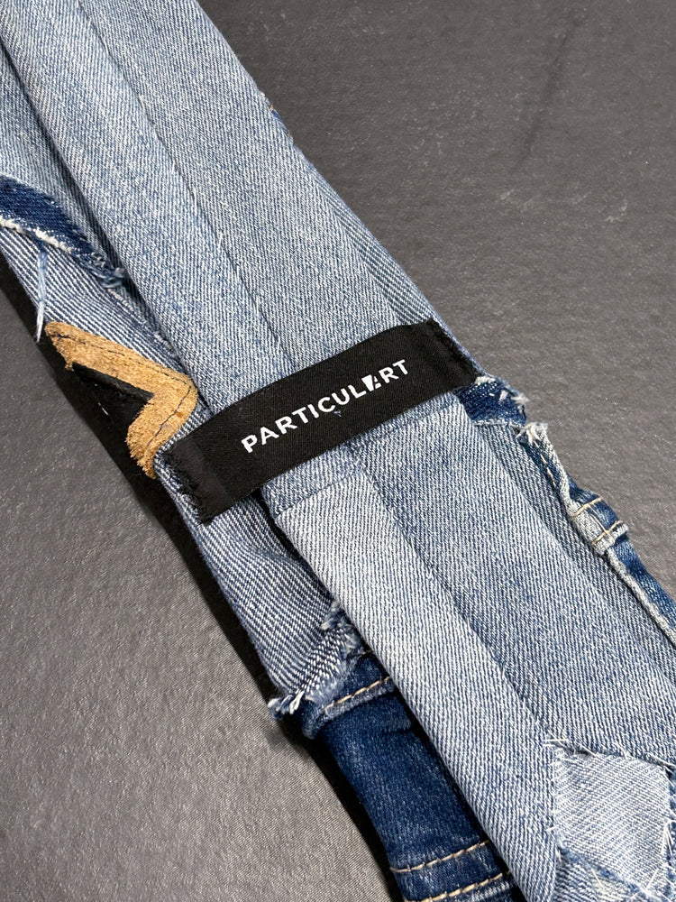 
                  
                    TIE FUSION RIPPED DENIM
                  
                