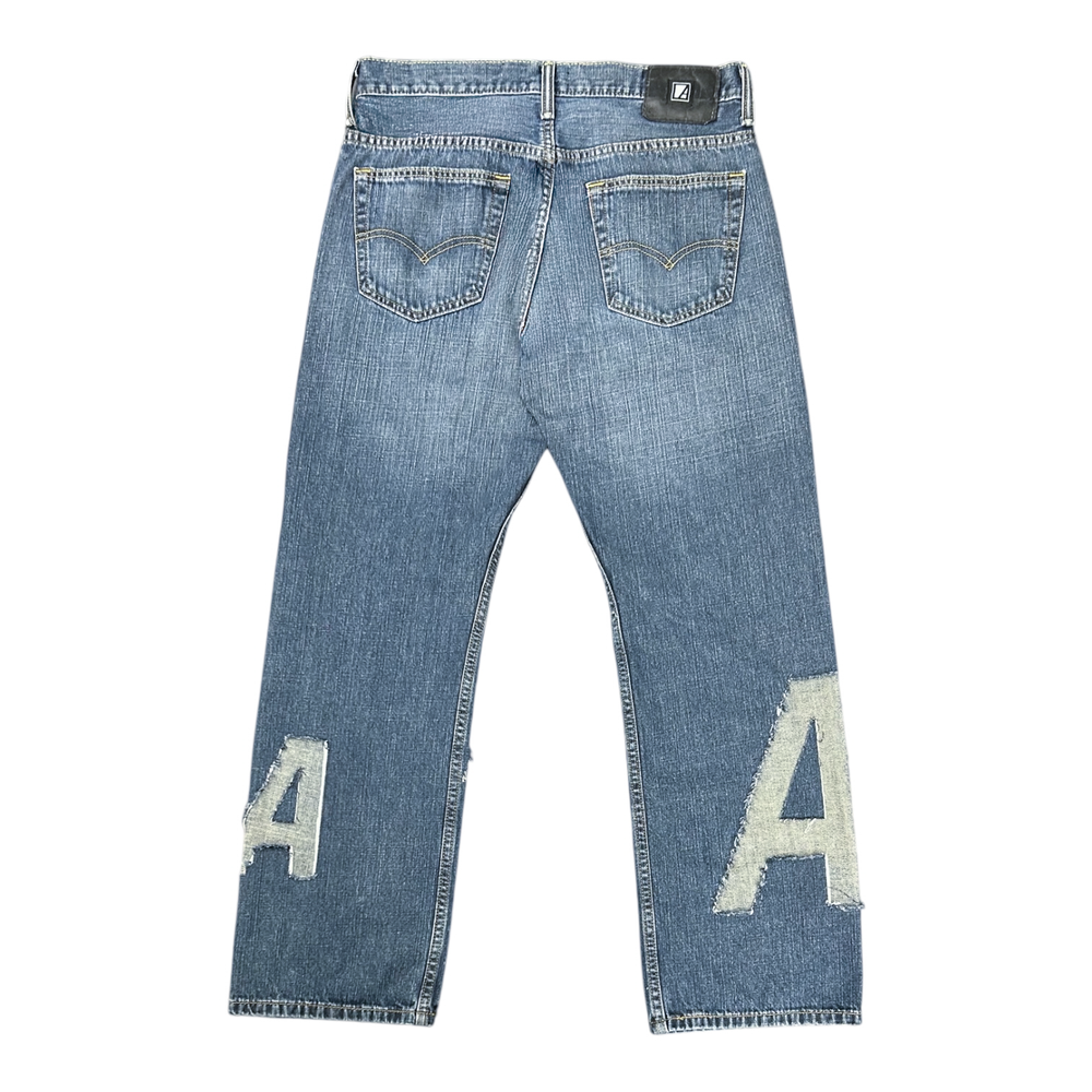 
                  
                    JEAN REVERSE LOGO CUT
                  
                